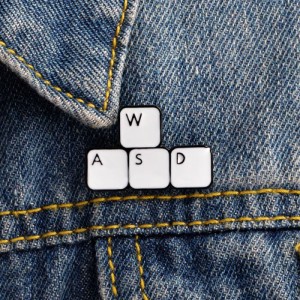 Металлический значок WASD